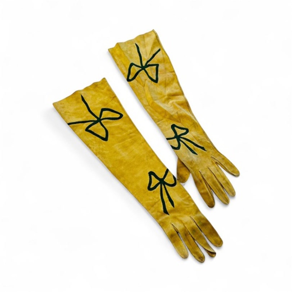 Elegant Yellow Gloves with Black Bow Design